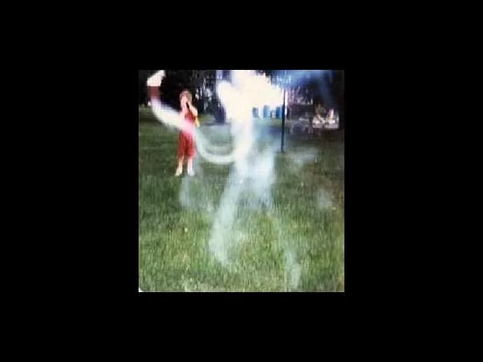Spirit presence, or ectoplasm, is more easily identified by well-defined vapor trails, as in this photograph.