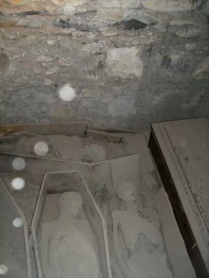 There is a lot of dust in this catacomb, so dust orbs cannot be ruled out. However, the photograph is intriguing!