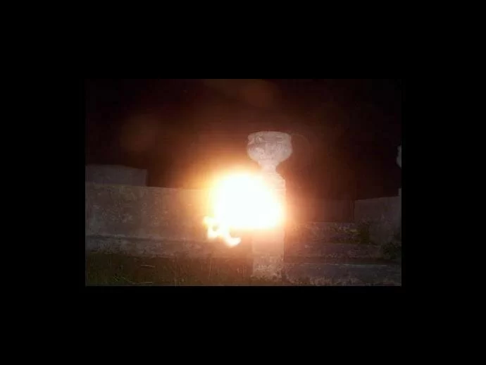 Ball of bright light - is it a ghost light or did the camera setting cause this anomaly? From Brandon Biddy.