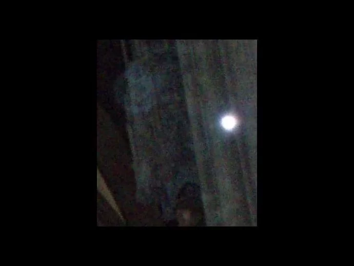 Do you see what looks like a face to the left of the orb?