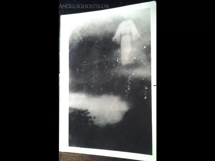 Photograph of the 'Jesus in the Clouds' photo...