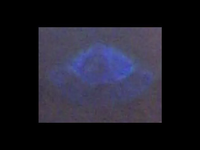 Close-up of the image on the floor. Do you see the Mary apparition and other faces in this picture?