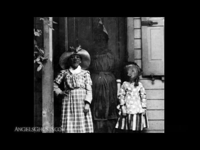 Old photo shows a ghostly lady in costume. Her face is almost invisible.