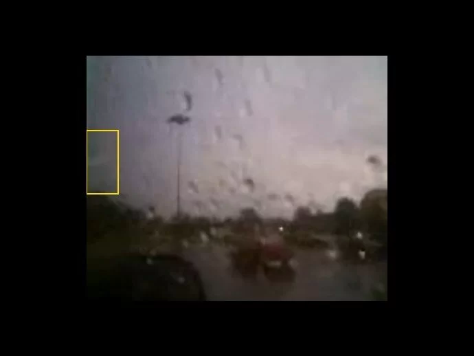 This photo is a screencapture from a video - strange light flying in the sky...