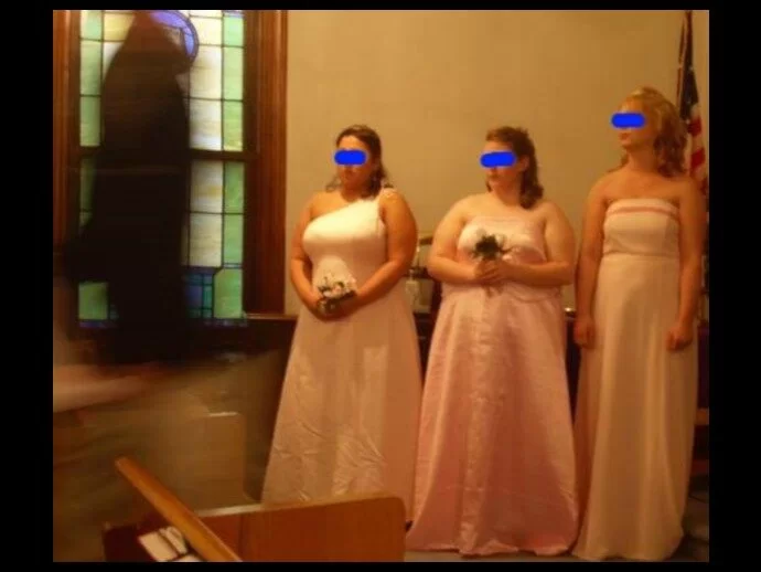 Amazing photograph from Dixie of a shadow ghost that appeared in tails walking down the aisle.