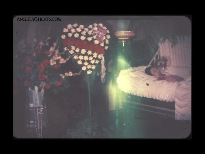 Original photograph of the spirit beside grandmother's casket...