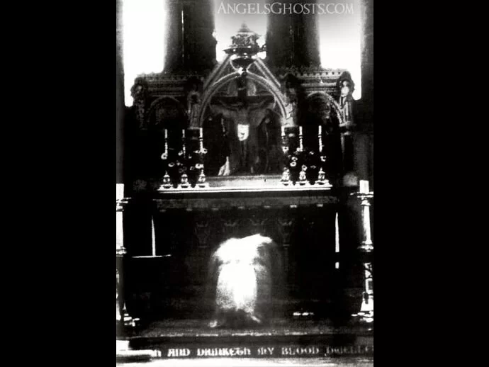 A ghost appears in front of an altar, praying...